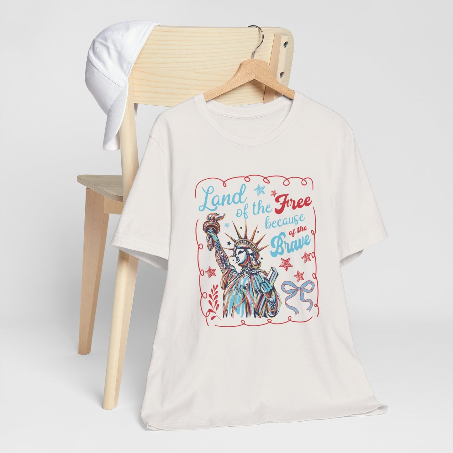 "Land of the free, because of the brave" Women's Graphic Tee