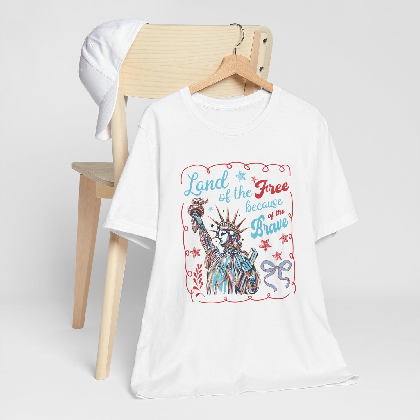 "Land of the free, because of the brave" Women's Graphic Tee