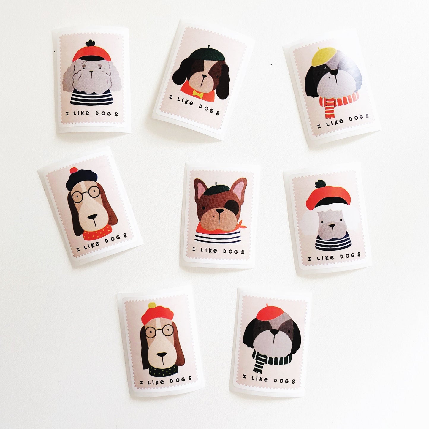 A collection of dog stickers with the phrase 'I Like Dogs' and illustrations of various dog breeds.