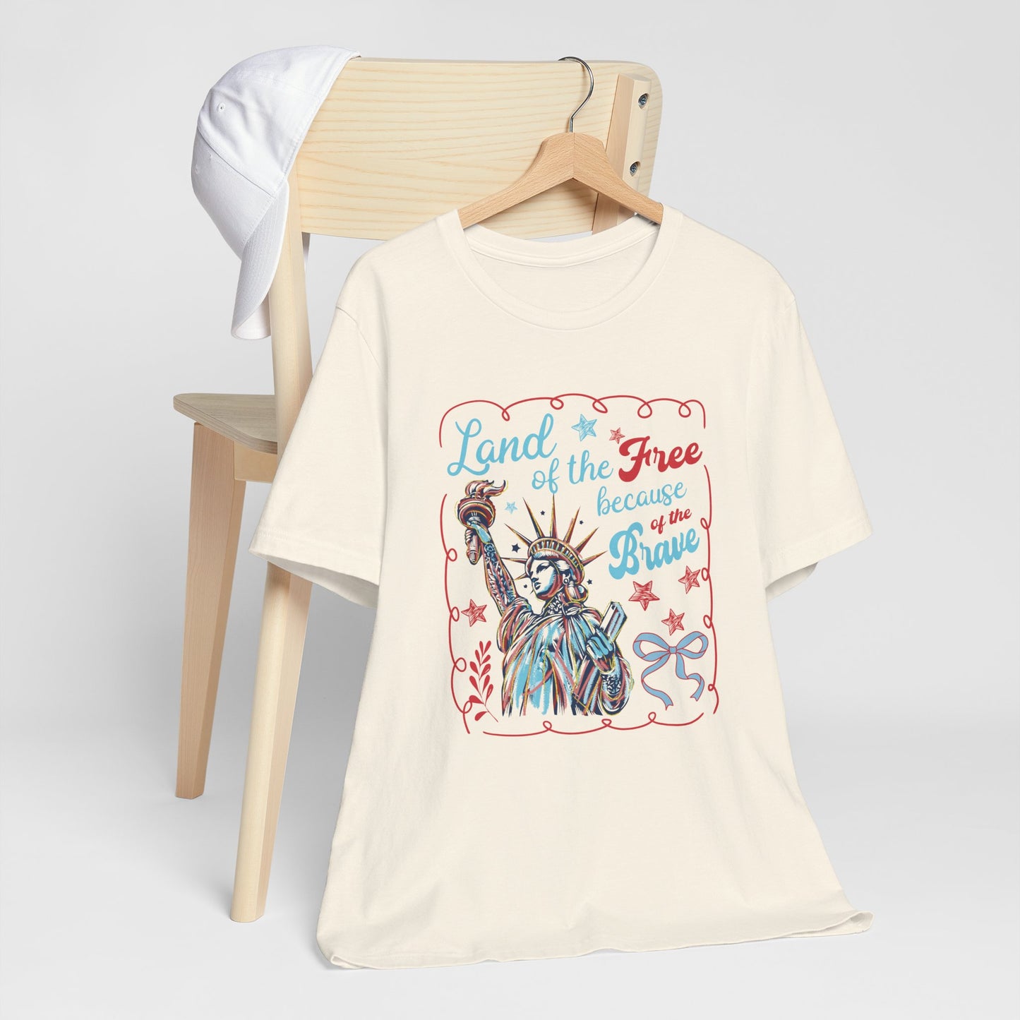"Land of the free, because of the brave"  Women's Graphic Tee