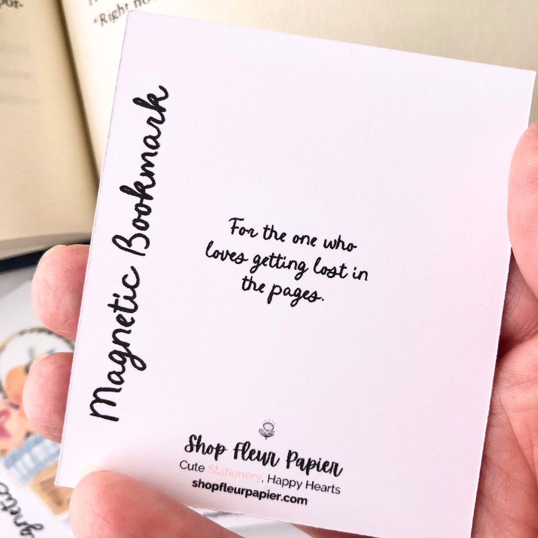 White card that reads Magnetic Bookmark, with the quote, "For the one who loves getting lost in the pages." And Shop Fleur Papier Branding